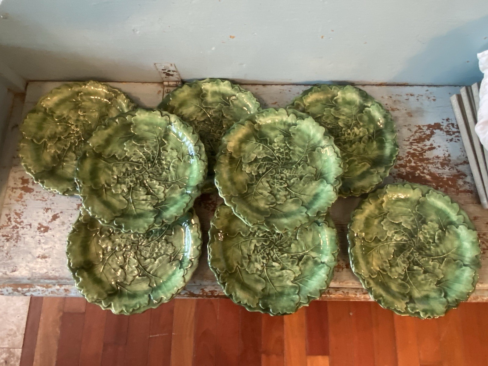 Hand-painted green majolica plate shaped like an oak leaf, marked Vietri, Italy.