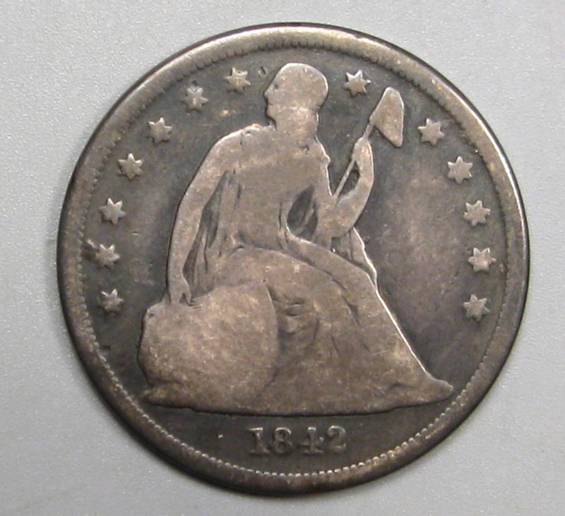 1842 Silver SEATED Dollar.