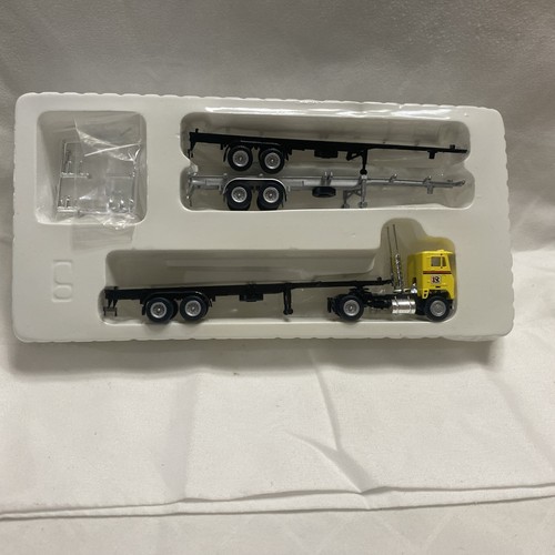 CON-COR HO 40’ PIGGYBACK TRACTOR W/ 3 CONTAINER CHASSIS RIDE LEASING COMPANY