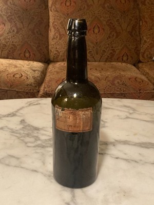 c1862 Black Glass Utility Whiskey Wine Bitters Booze Back Bar Bottle with Label