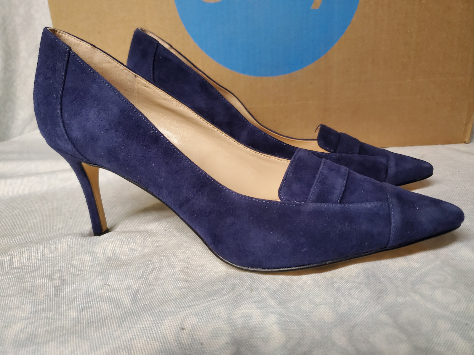 quavissa pointy toe bow pumps