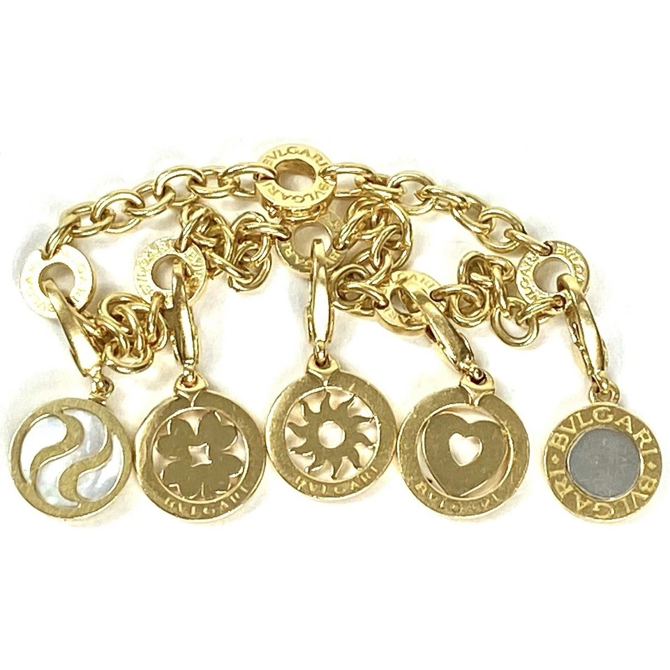 Brazalete Vintage Bvlgari Bulgari Oro Amarillo 18K 5 Dijes Corazón Sol Trébol Perla Foto 2 de 4