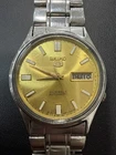 Vintage Seiko 5 Automatic 7009-598J Watch Gold Dial 21 Jewels Day/Date Stainless