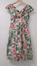 Talbot florl dress with a surplice V-neckline and cap sleeve. size: 8p