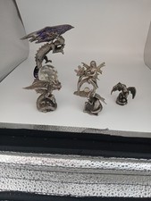 Pewter Dragons X 4 Plus 1 Other