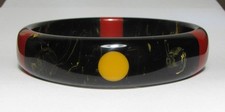 Signed Yellow Polka Dot Marbled Black and Red Bakelite Bangle Bracelet