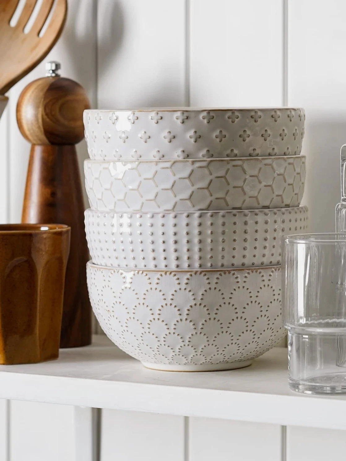 Le Tauci small embossed white bowls stacked showing different textures