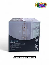 Hampton Bay Nelwyn 1-Light Vintage Brass Pendant with Clear Glass Globe Shade