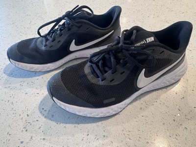 Women s Black & White Nike Revolution