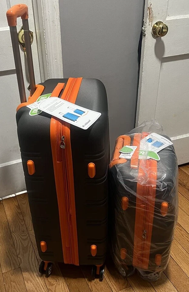 Juego de 2 piezas de equipaje rígido Rockland giratorio expandible 28" 20" carbón Foto 2 de 4