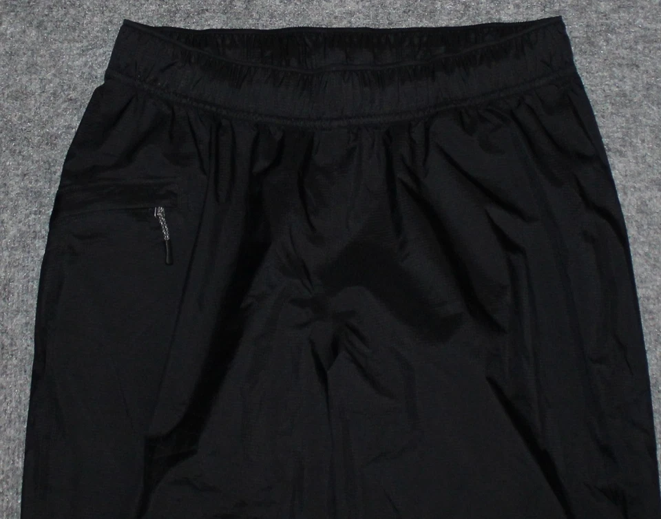 REI CO-OP PANTALÓN DE LLUVIA ESENCIAL PARA MUJER 137553 Impermeable Embalable Negro XS Pantalones Foto 2 de 4