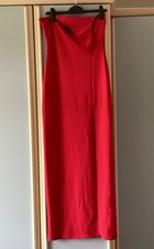 red evening dress with slit detail , maxi length