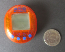 Vintage 1997 Playmates Toys Orange NANO BABY VIRTUAL PET TOY For parts Repair