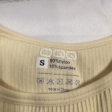 OQQ Solid Beige Ribbed Sleeveless Stretch Mild Compression Bodysuit Women S
