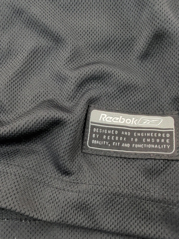 Camiseta deportiva pequeña para adultos Julius Peppers Carolina Panthers marca Reebok Foto 2 de 4