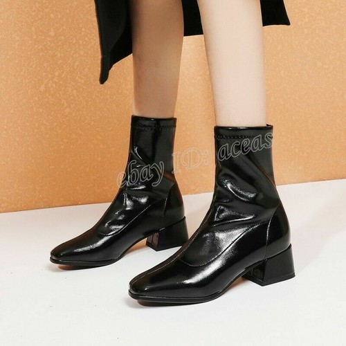 patent leather stretch boots