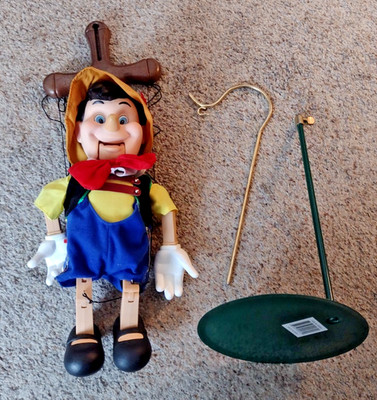 ITEL DISNEY PINOCCHIO PUPPET WITH STAND OPENS MOUTH AND SINGS AND DANCES WORKS