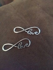 2 Love Infinity charms. Silver tone. Free shipping.