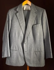 Tailor made gray, three-piece wool suit