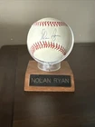 NOLAN RYAN AUTOGRAPHED HAND SIGNED BASEBALL  WITH HOLDER