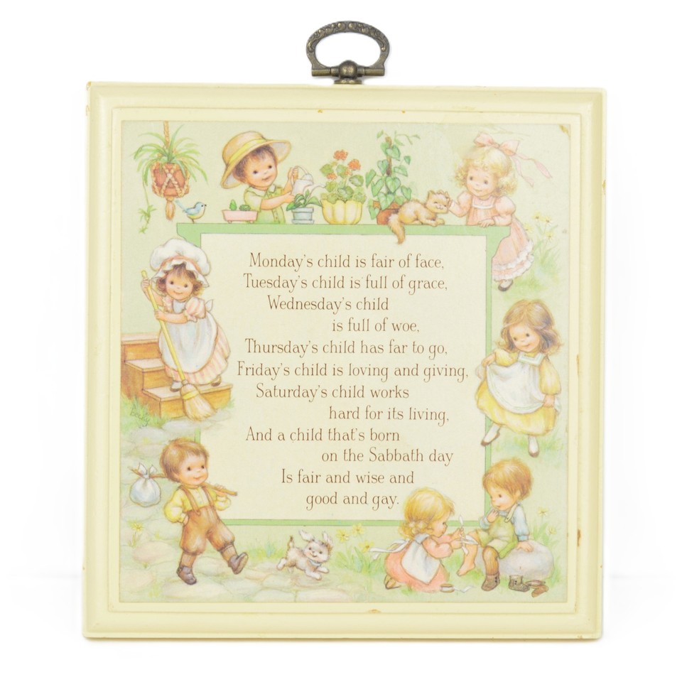 A used vintage 'Monday's Child' nursery rhyme wall plaque — the kind of charming, slightly eerie retro kids-room art that collectors and maximalist decorators go nuts for.