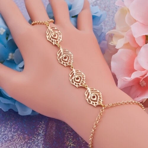 Gold bracelet with store ring attached designs