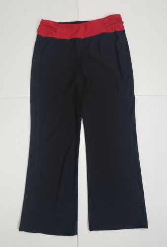 Xersion Activewear pants. Elastic waist with tie, black with blue stripe. Lg