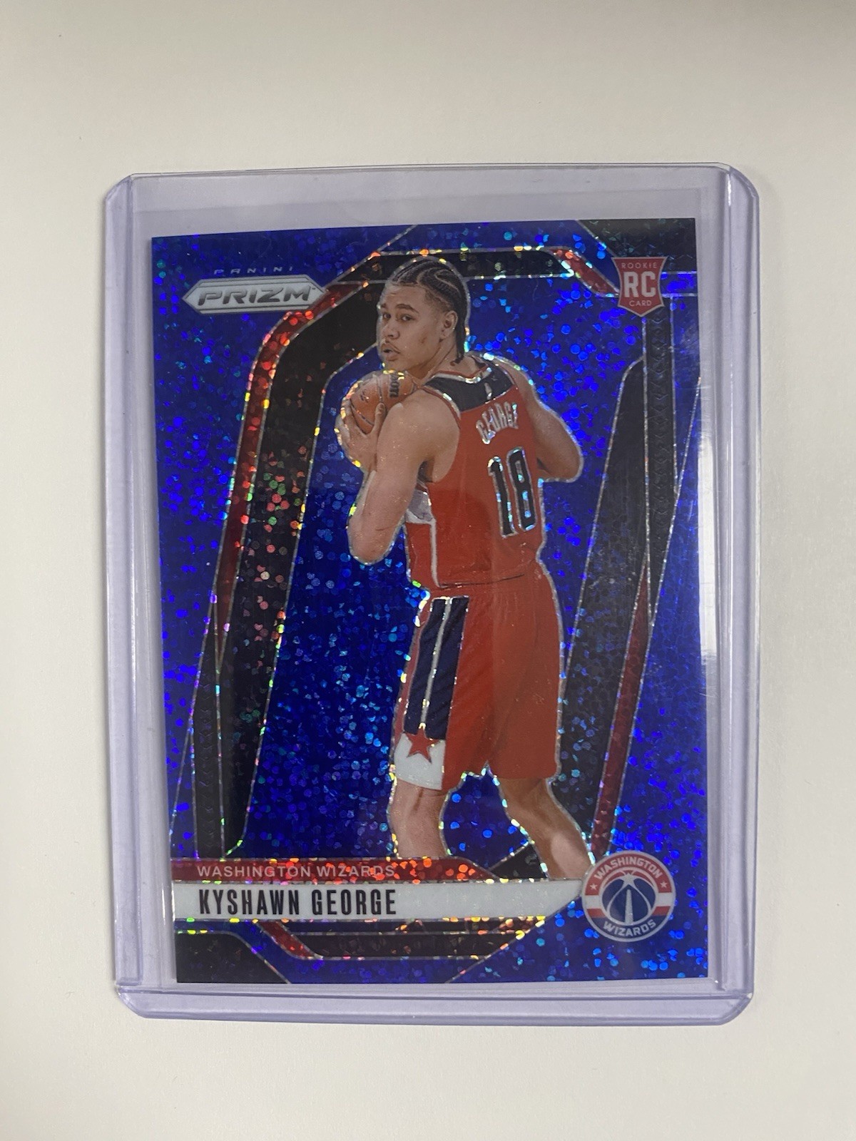 2024-25 Panini Prizm - Kyshawn George #257 Blue Sparkle Prizm /144 (RC)