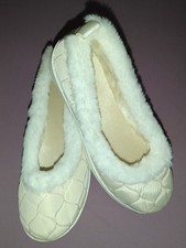 women's warm faux suede plush slippers with soft, comfortable fluffy fur lining.