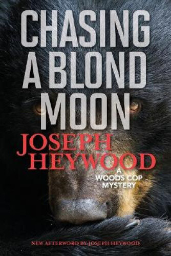 Thumbnail - Chasing A Blond Moon: A Woods Cop Mystery By Heywood, Joseph