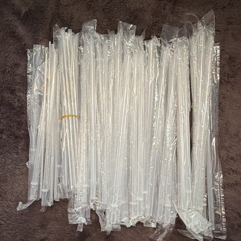 Assortment of plastic and metal Tumblers  Straws