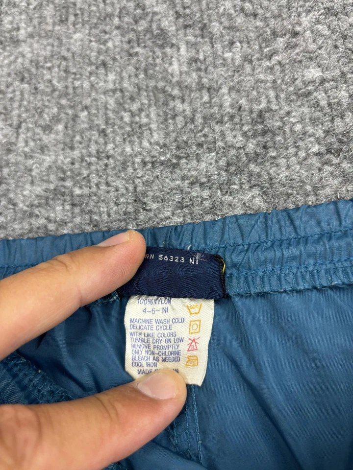 Pantalones cortavientos vintage Nike para hombre grandes azules de nailon hechos en Japón años 90 Foto 4 de 4