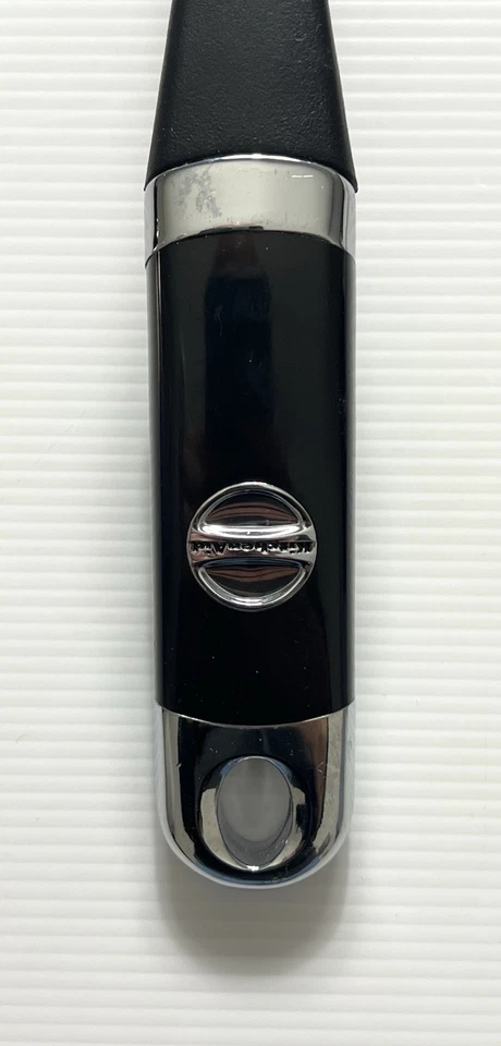 Espátula y cuchara ranurada de silicona clásica KitchenAid mango negro y cromado Foto 3 de 3