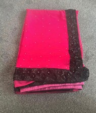 Beautiful bright pink saree with black flower border. Blouse Included Size 8