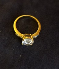Gold Tone Ring with A Crystal Stone