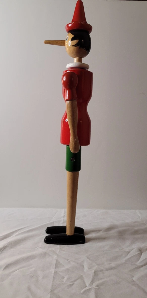 Antique wooden pinocchio best sale doll