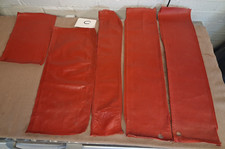 Leather pieces, used, red, "C".