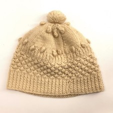Older ivory wool knit winter hat
