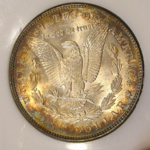 1886 Morgan Silver Dollar-  BU, Colorful toning both sides, Plastic case 5186