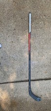 right handed Bauer hyperlite senior hockey st...