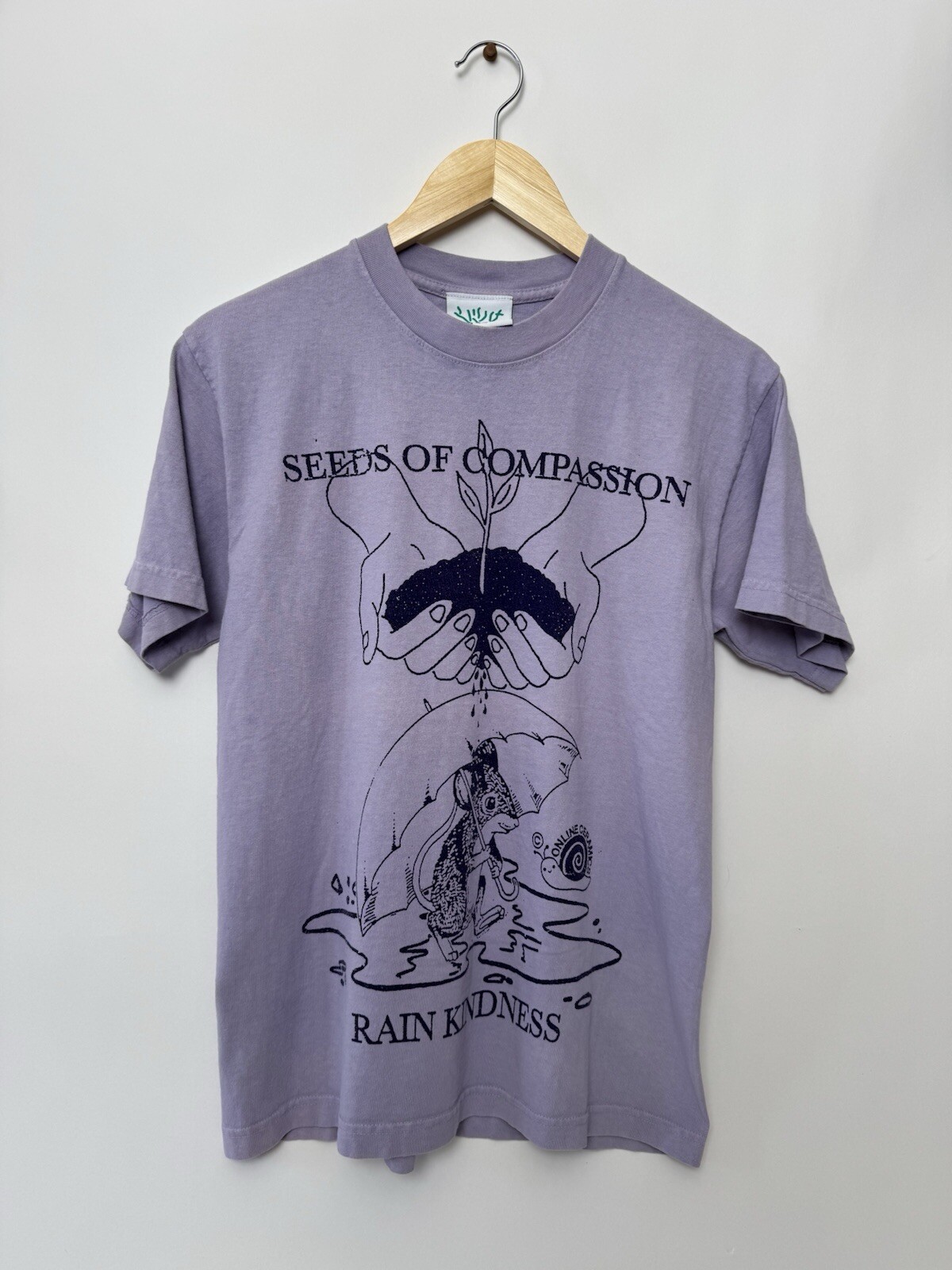 Online Ceramics Seeds of Compassion Rain Kindness Graphic Tee Small-image