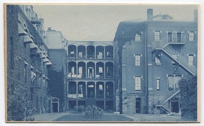CYANOTYPE ARCHITECTURAL BUILDING WITH PORCHES. STRONG CONTRAST.