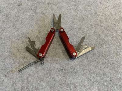 Leatherman Micra Multi Tool Red Transparent Plastic Coating Chipped