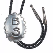 Vintage BS Navajo sterling silver concho style bolo tie