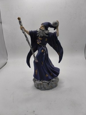 Wizard Figurine and Illustrated King Arthur and His Knights of the Round Table