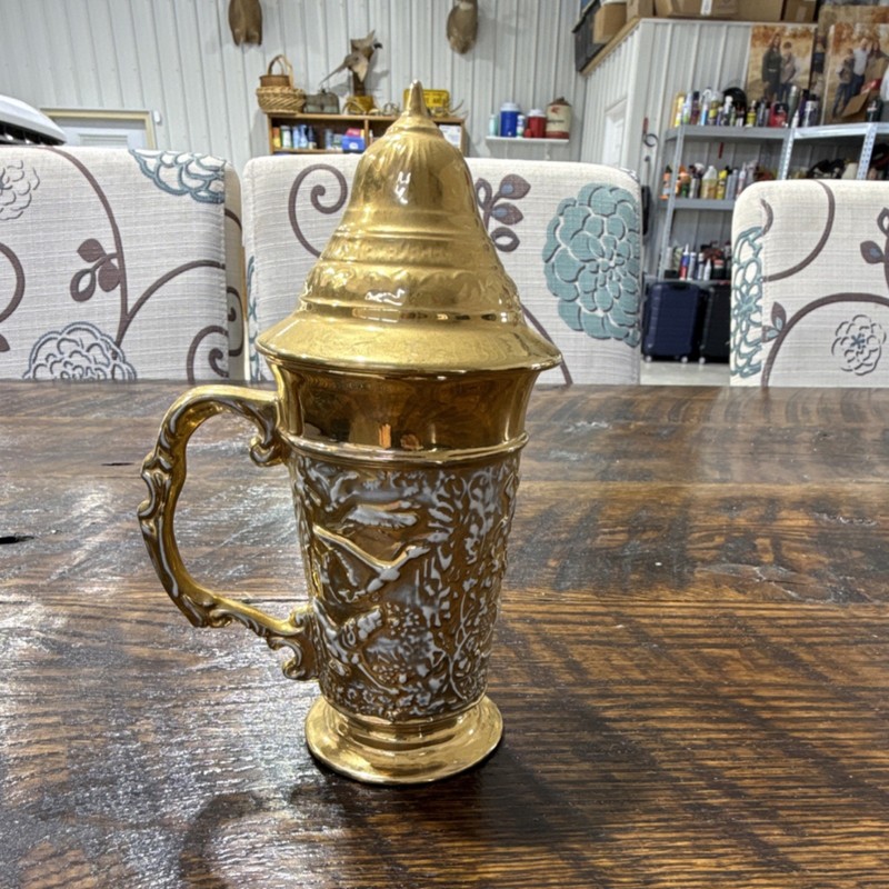 Gold and white lidded stein with ornate design, made in Germany