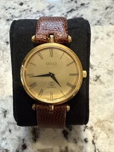 MONTRE GUCCI 2000M UNISEXE vintage cadran champagne chiffre romain très bon état pile neuve