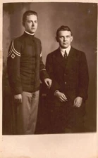 Vintage Postcard Photograph Two Boys In Uniform Military Service Suit Art Studio
