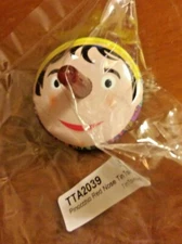 Pinocchio Mini Tin Top Plastic .75" Red Nose Spins the Top w/Thumb & Index Fingr