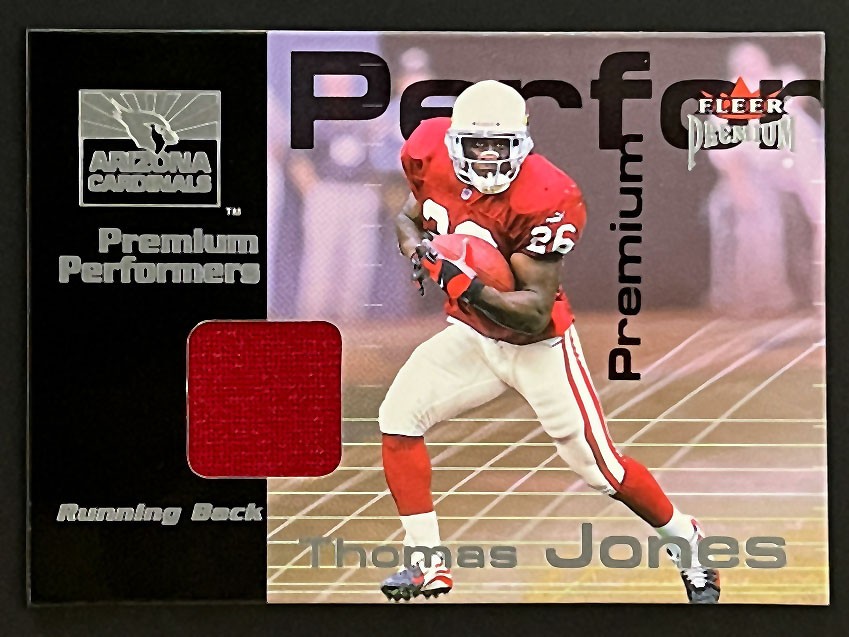 2001 Fleer Premium #NNO Thomas Jones /900 Premium Performers Jersey
